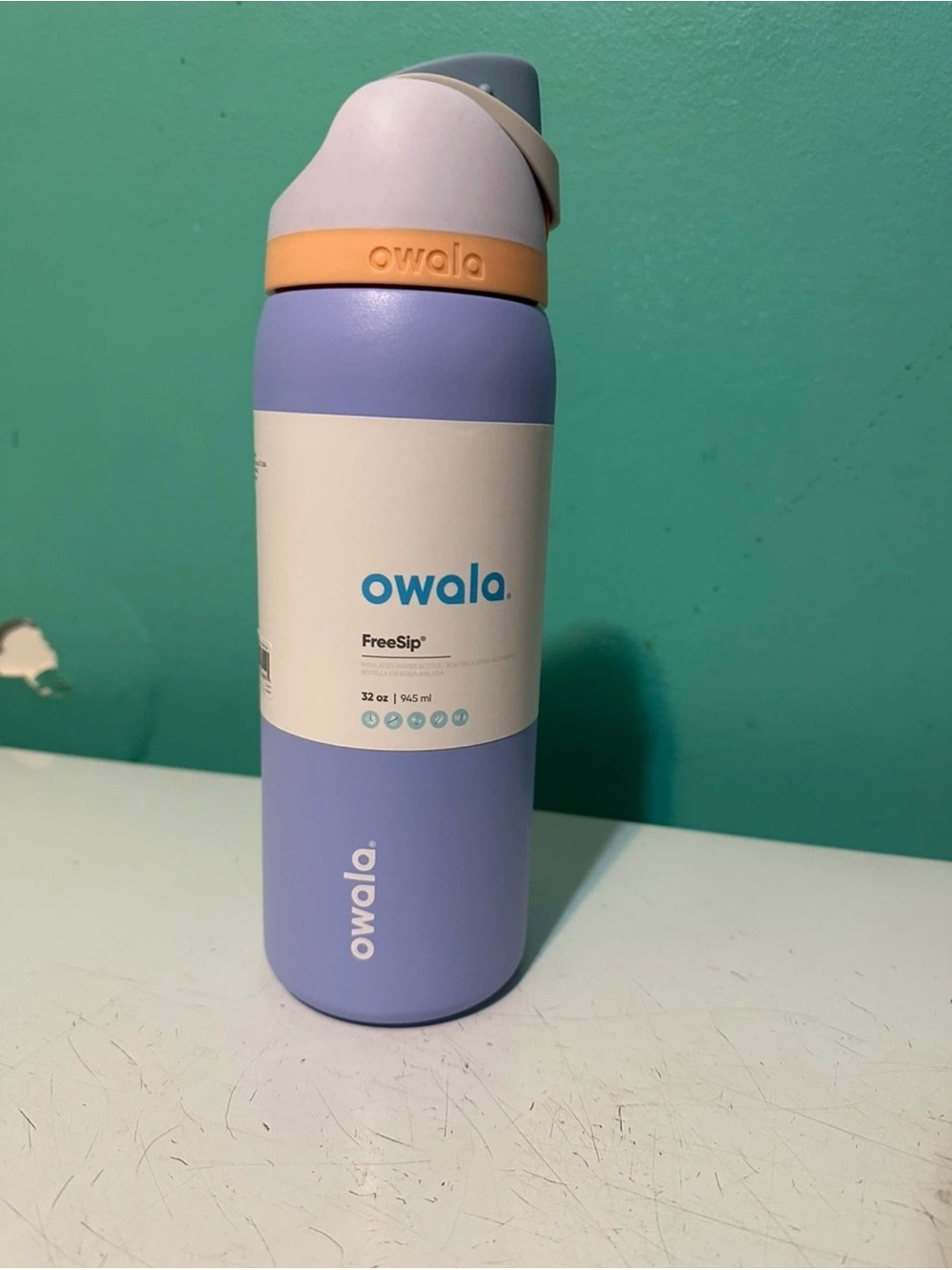 Owala FreeSip Insulated Water Bottle - Lavender with Peach Accent